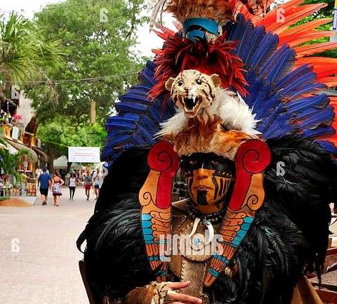 History of playa: traditional costume in the tourist streets