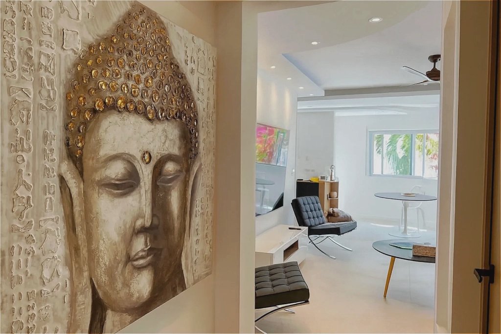 Elegant Buddha décor in a bright contemporary interior Decorative Buddha sculpture overlooking a bright modern apartment in Playa del Carmen