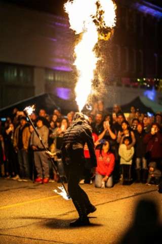 fire-eater at the festival of the dead in mexico