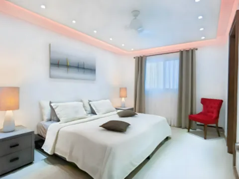 Une suite king calme et élégante, pensée pour des nuits confortables à Playa del Carmen Suite king moderne et confortable de l’appartement QUADRA à Playa del Carmen